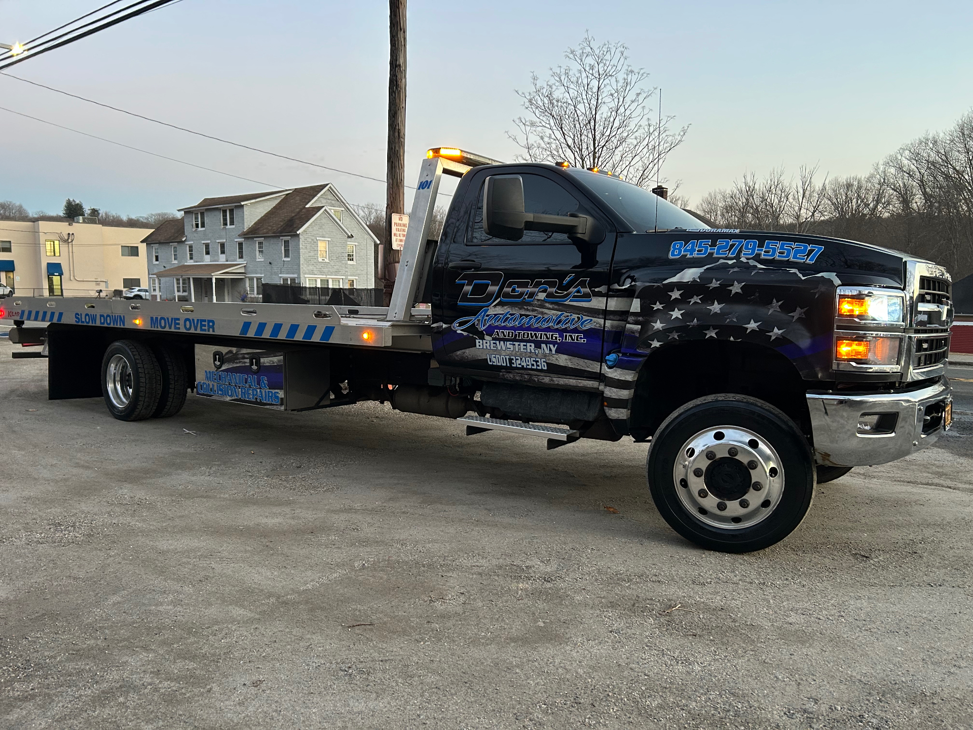 Don's Automotive and Towing flatbed truck in Brewster, NY